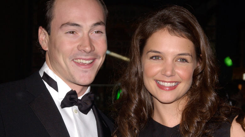 Katie Holmes smiling with Chris Klein