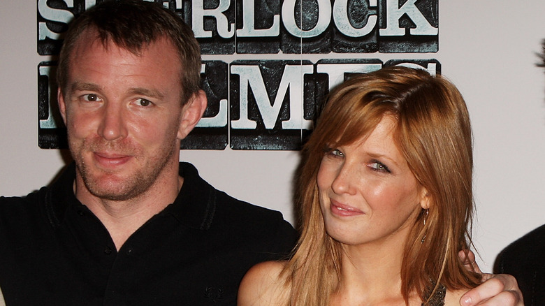 Guy Ritchie, Kelly Reilly, smiling together