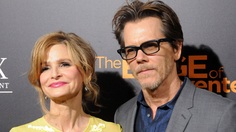 Kyra Sedgwick and Kevin Bacon posing