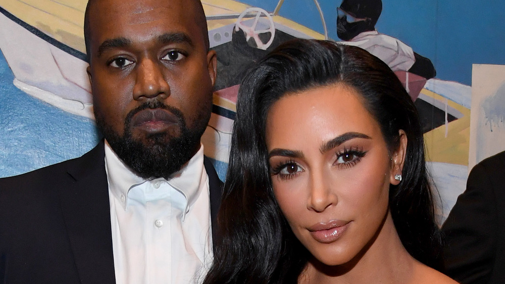 Kim Kardashian and Kanye West pose together in 2019