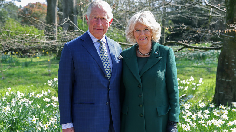 King Charles and Queen Camilla outdoors