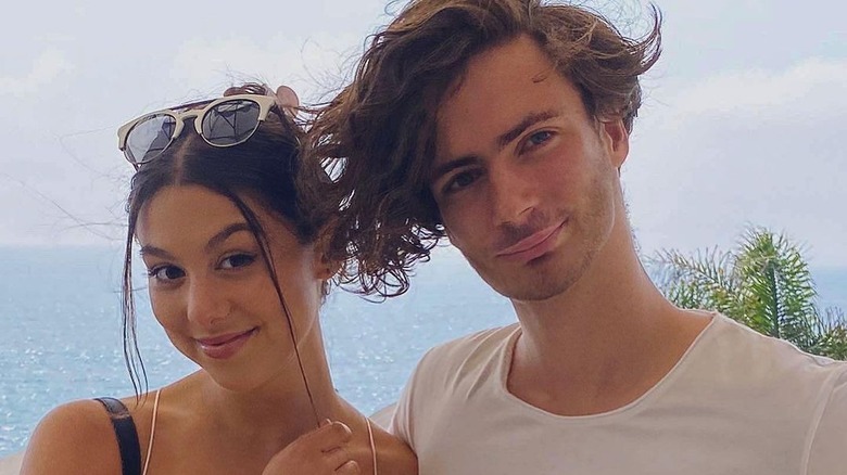 Kira Kosarin, Max Chester posing outdoors