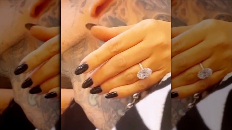 Kourtney Kardashian showing off engagement ring