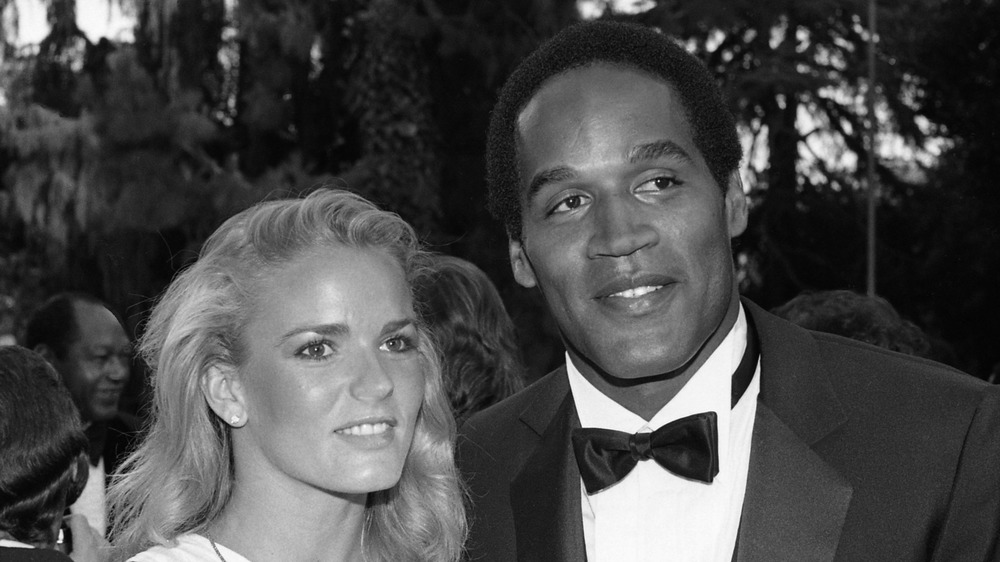 Nicole Brown Simpson and O.J. Simpson smile