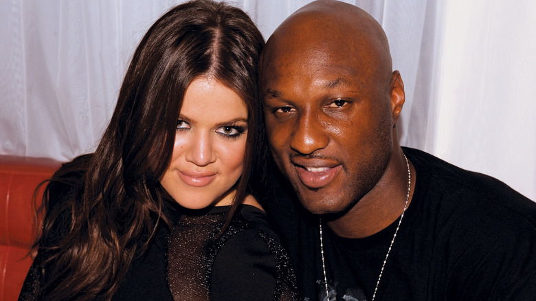 Khloé Kardashian and Lamar Odom posing