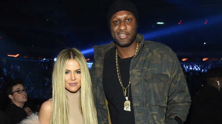 Khloé Kardashian posing with Lamar Odom