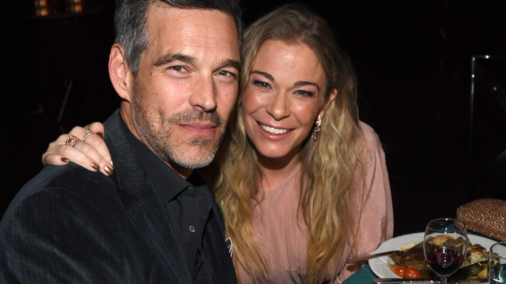 Eddie Cibrian and LeAnn Rimes seated and smiling