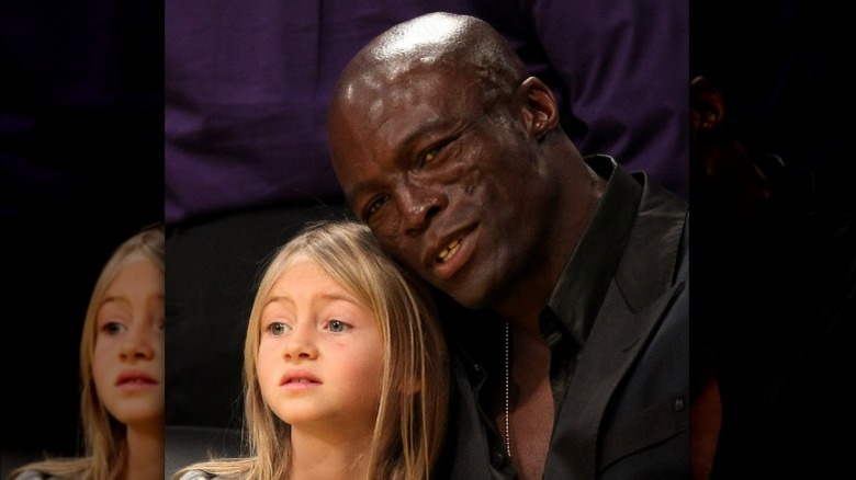 Seal resting cheek against Leni Klum's head