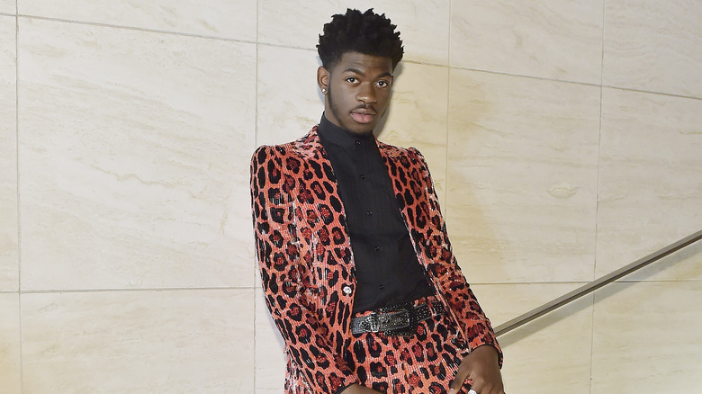 Lil Nas X wearing a leopard suit