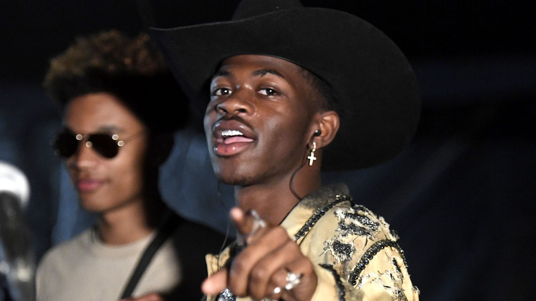 Lil Nas X pointing at camera