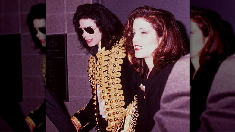 Michael Jackson and Lisa Marie Presley at a concert in 1994