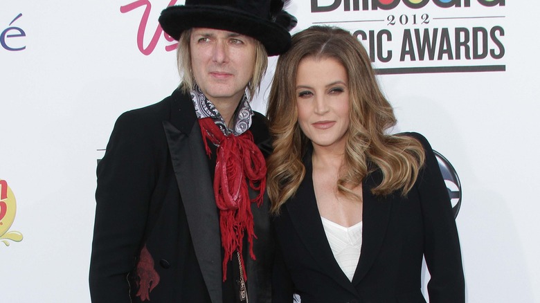 Michael Lockwood and Lisa Marie Presley posing together