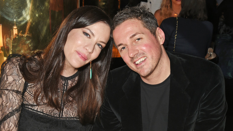 Liv Tyler, Dave Gardner posing