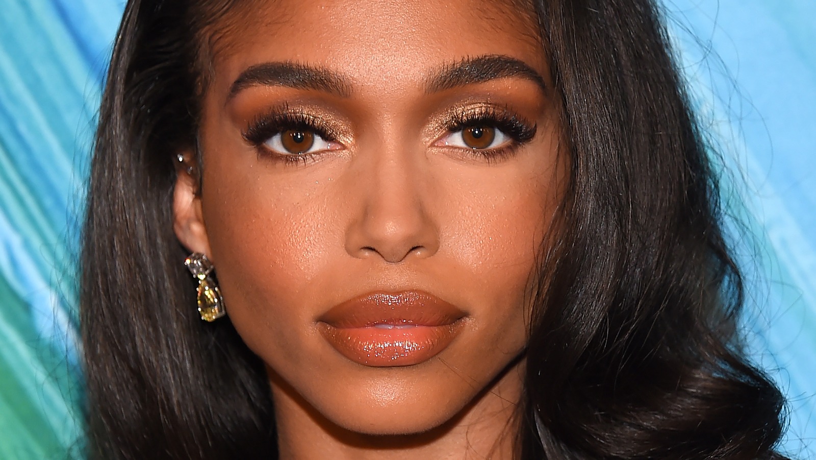 Lori Harvey Celebrates Sweet Moment Between Parents Steve and Marjorie