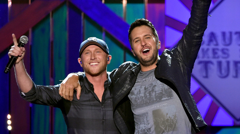 Cole Swindell Luke Bryan onstage