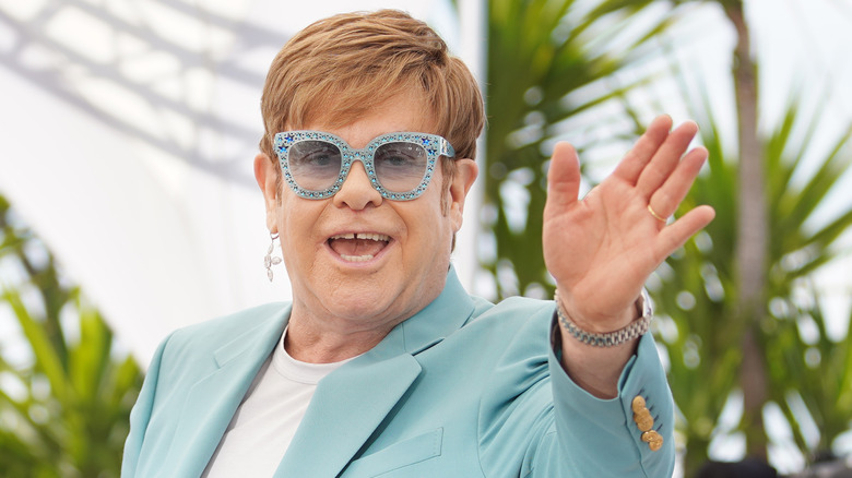 Elton John waving