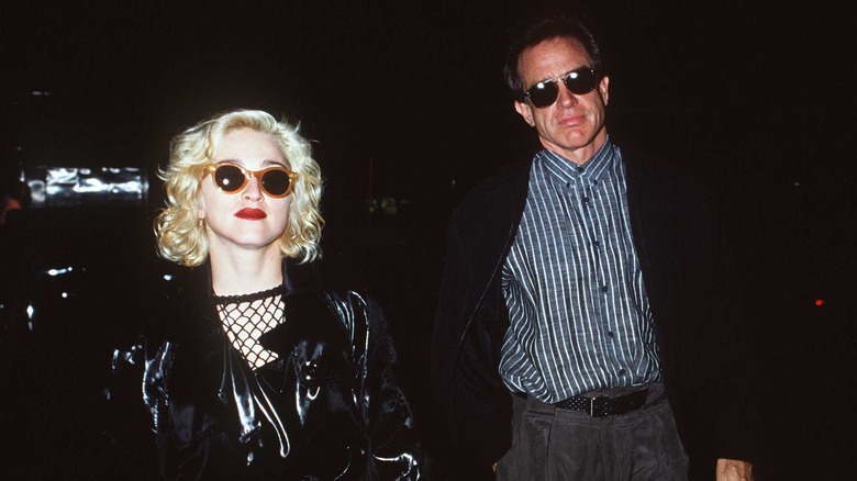 Madonna and Warren Beatty are pictured in 1990