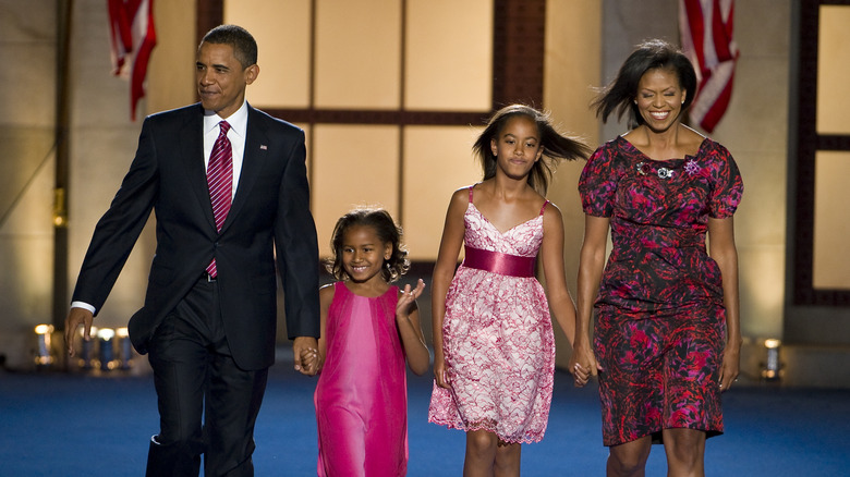 The Obama family walking together