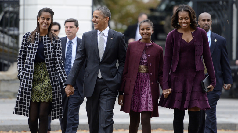 The Obama family walking together