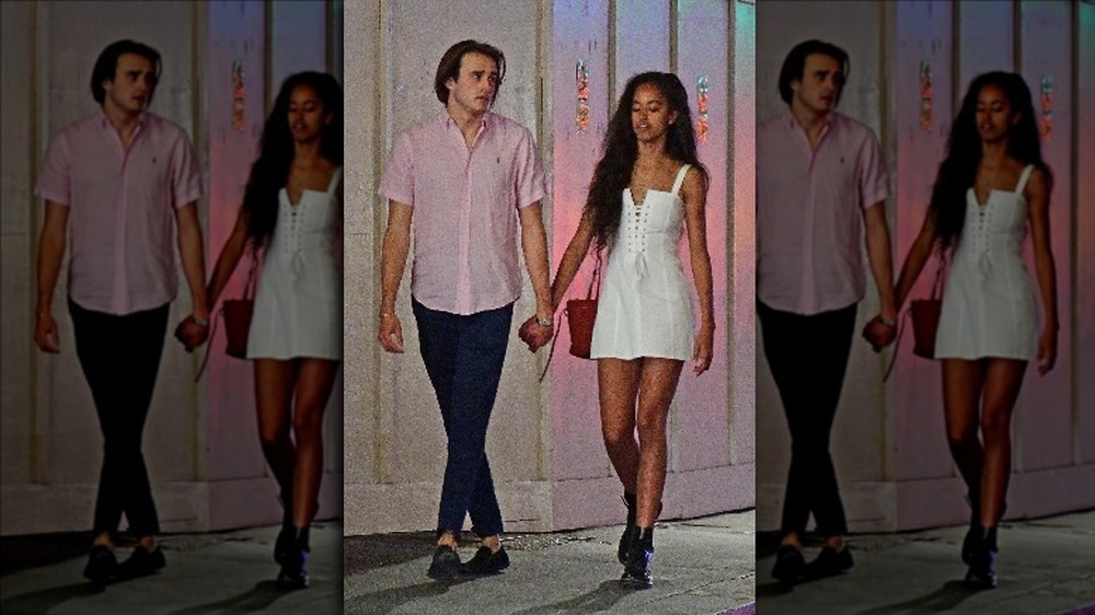 Rory Farquharson and Malia Obama walking hand in hand 