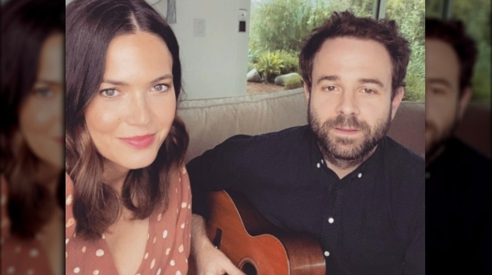 Mandy Moore and Taylor Goldsmith, smiling