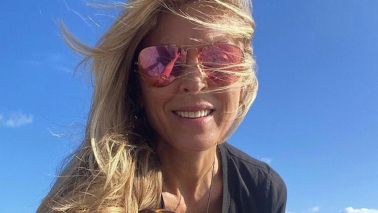 Marla Maples in sunglasses on the beach