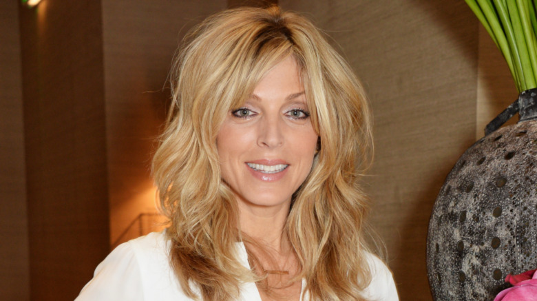 Marla Maples smiling in spa-like environment