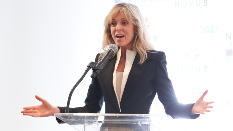 Marla Maples excitedly speaks into microphone