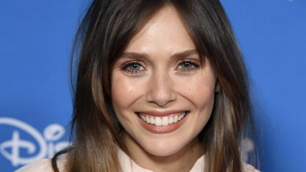 Elizabeth Olsen attends D23 Disney+ showcase at Anaheim Convention Center