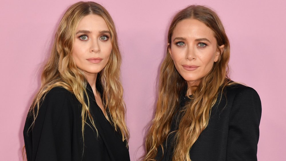 US fashion designers Mary-Kate (R) and Ashley Olsen arrive for the 2019 CFDA fashion awards at the Brooklyn Museum in New York City