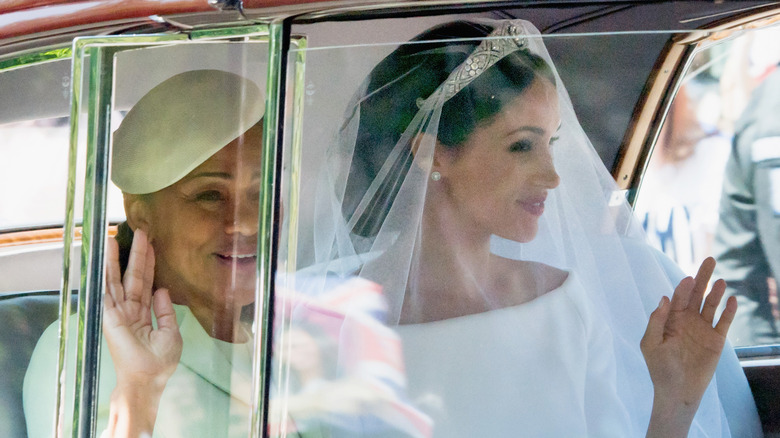 Doria Ragland and Meghan Markle smiling 