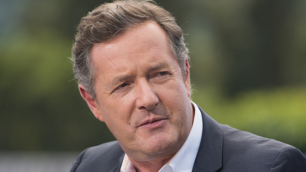 Piers Morgan looking serious while speaking