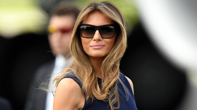 Melania Trump wearing sunglasses at an event 