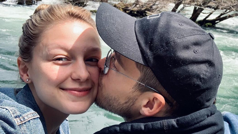 Chris Wood kisses Melissa Benoist's cheek