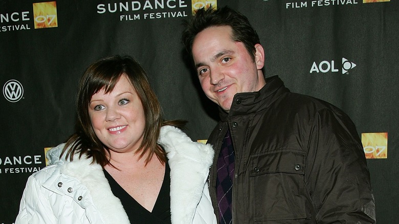 Melissa McCarthy and Ben Falcone grinning