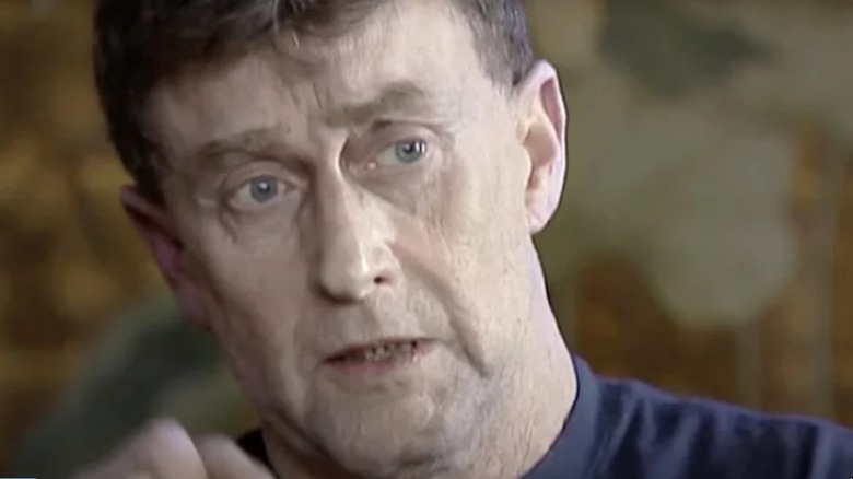 Michael Peterson head tilted to left looking sad