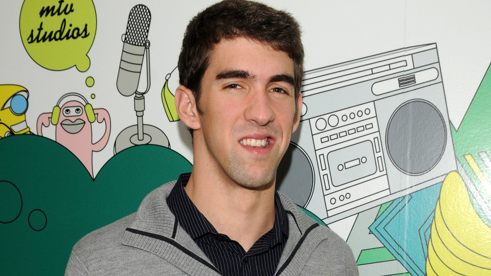 Michael Phelps smiling on the red carpet