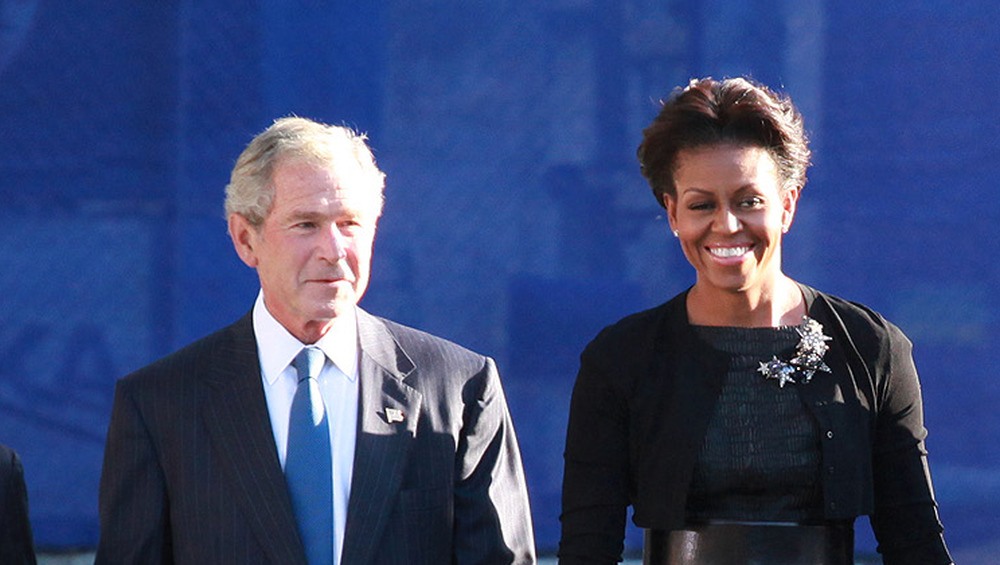 Michelle Obama playfully embraces George W. Bush at an event in 2016