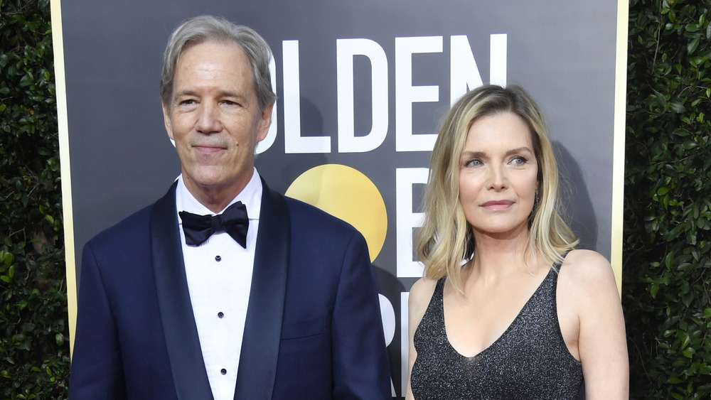 Michelle Pfeiffer and David E Kelley attending the 77th Annual Golden Globe Awards