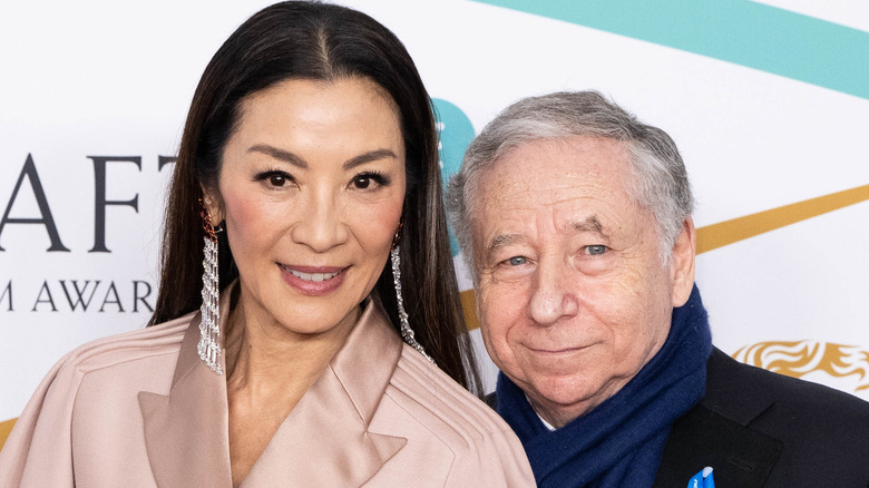 Michelle Yeoh and Jean Todt posing at BAFTAs