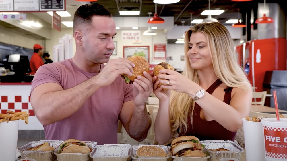 Mike and Lauren Sorrentino eating