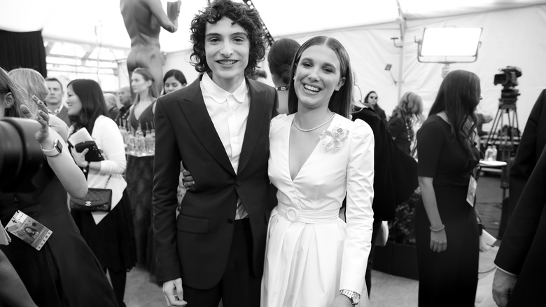 Finn Wolfhard and Millie Bobby Brown smiling