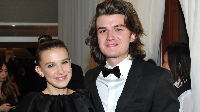 Millie Bobby Brown posing with Joe Keery