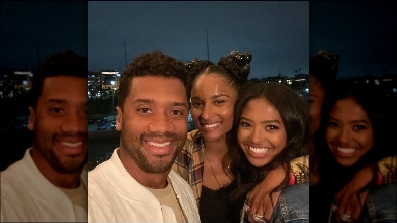 Russell Wilson taking a selfie with Natalia Bryant and Ciara