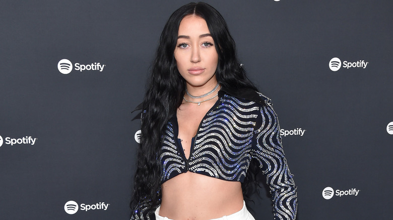 Noah Cyrus posing