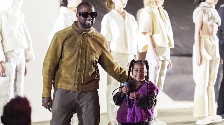 Kanye West and North West smiling