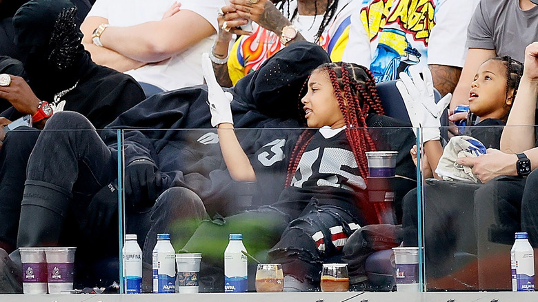 Kanye and North West courtside