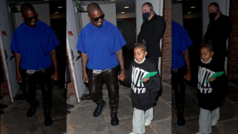 Kanye West, North West holding hands