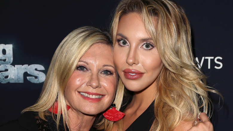 Olivia Newton-John and Chloe Lattanzi posing for a picture