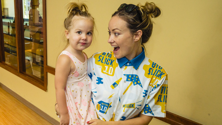 Olivia Wilde holds daughter Daisy